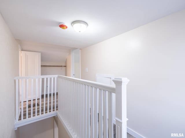 hallway with an upstairs landing