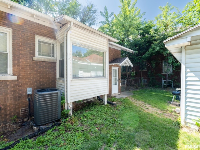 view of yard featuring central AC