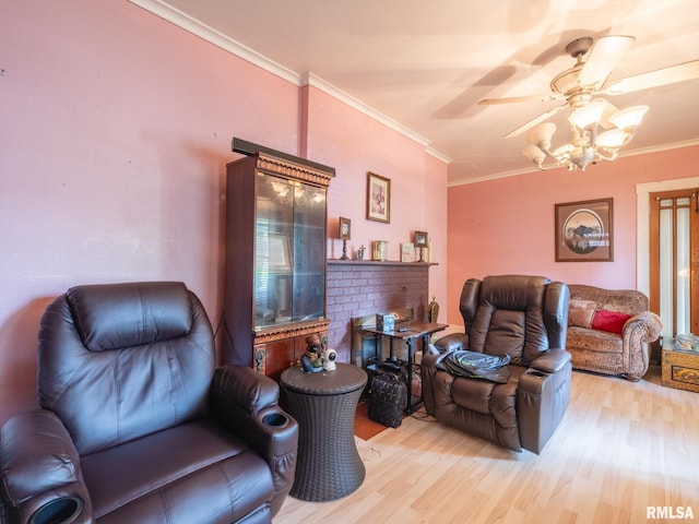 living room featuring wood finished floors and crown molding