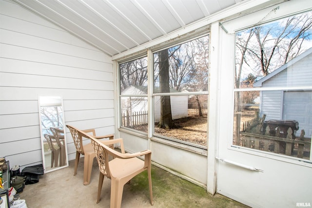 sunroom / solarium with lofted ceiling