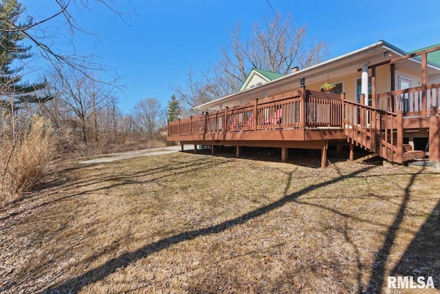 back of property with a deck