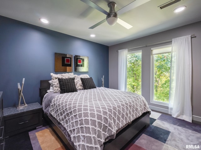 bedroom with baseboards, visible vents, a ceiling fan, and recessed lighting