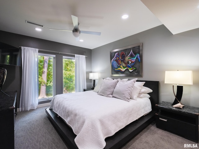 carpeted bedroom featuring ceiling fan, visible vents, and recessed lighting