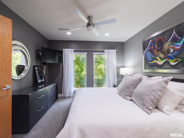 bedroom featuring ceiling fan, carpet floors, multiple windows, and recessed lighting