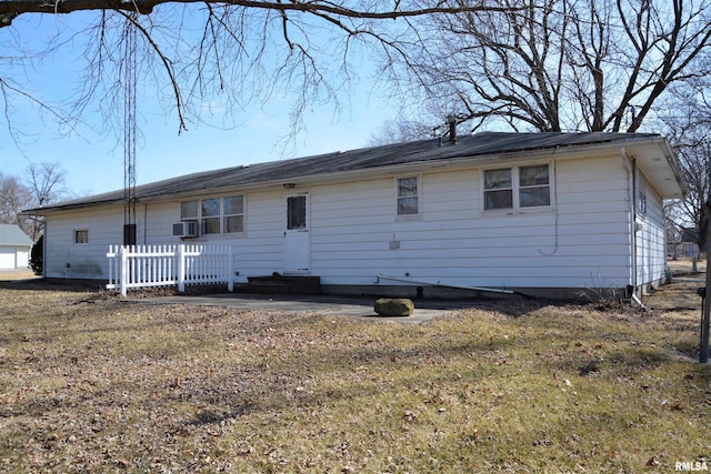 back of house featuring entry steps