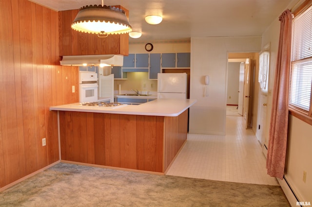 kitchen featuring light colored carpet, a baseboard heating unit, a peninsula, white appliances, and under cabinet range hood