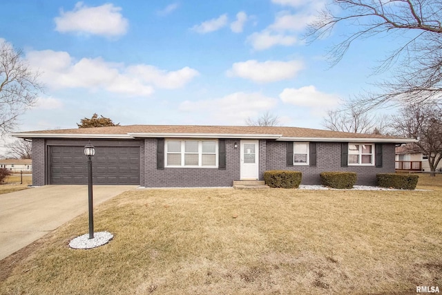 ranch-style home featuring a front lawn, brick siding, driveway, and an attached garage