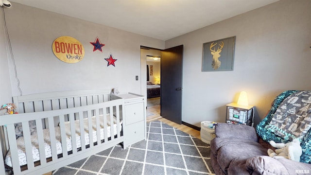 bedroom featuring wood finished floors