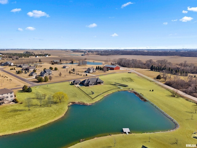 bird's eye view featuring a rural view and a water view