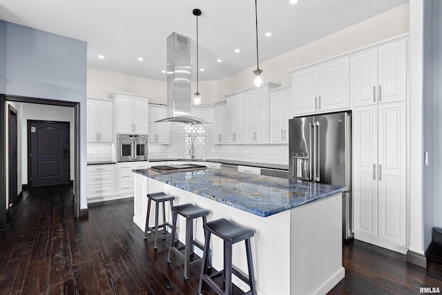 kitchen featuring recessed lighting, stainless steel appliances, a large island, island range hood, and dark wood-type flooring