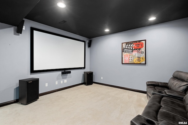 cinema room featuring light colored carpet, baseboards, and recessed lighting