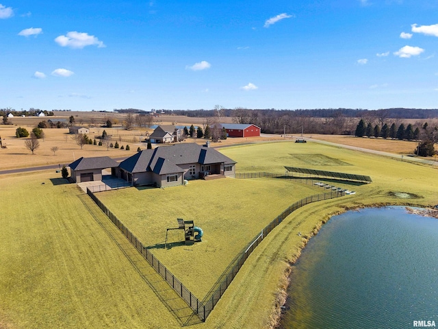 birds eye view of property featuring a rural view and a water view