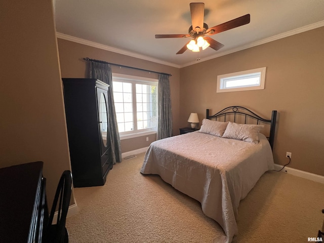 bedroom featuring crown molding, light colored carpet, visible vents, a ceiling fan, and baseboards