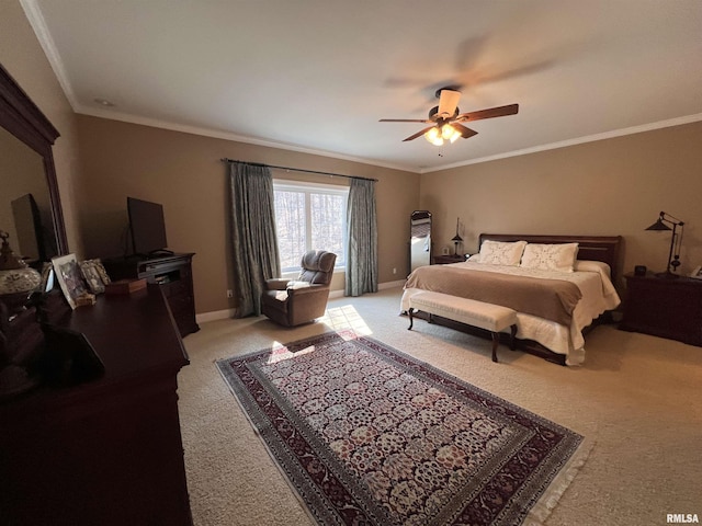 bedroom featuring baseboards, crown molding, and light colored carpet