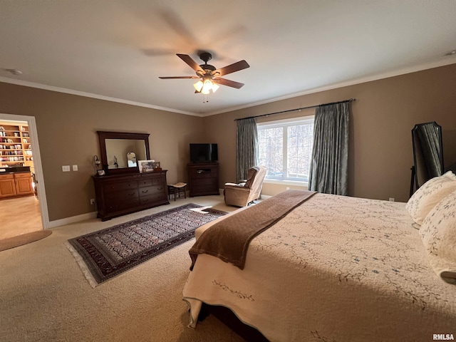 bedroom with crown molding, baseboards, a ceiling fan, and light colored carpet