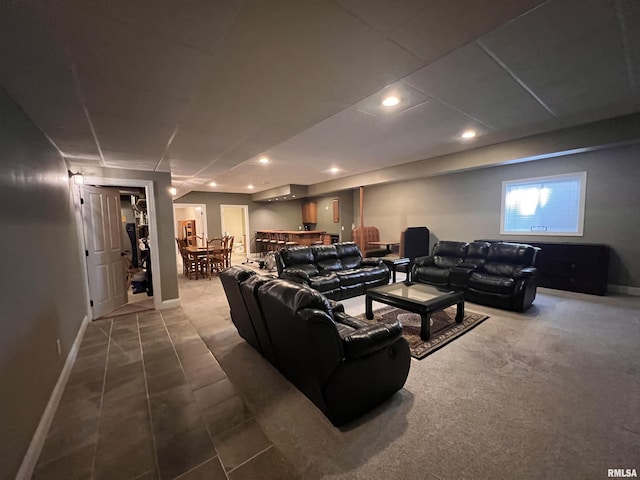 home theater with recessed lighting and baseboards