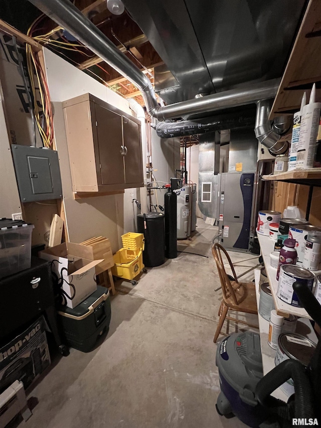 unfinished basement with heating unit, electric panel, and electric water heater