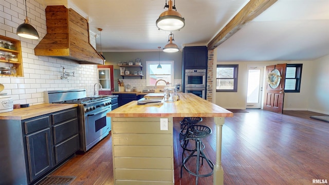 kitchen with open shelves, butcher block counters, stainless steel appliances, and a kitchen breakfast bar