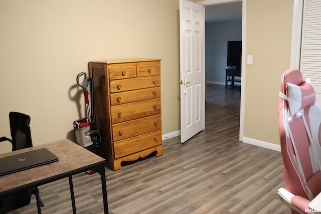 office featuring light wood finished floors and baseboards