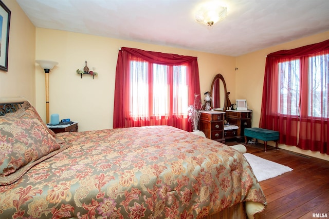 bedroom with wood-type flooring