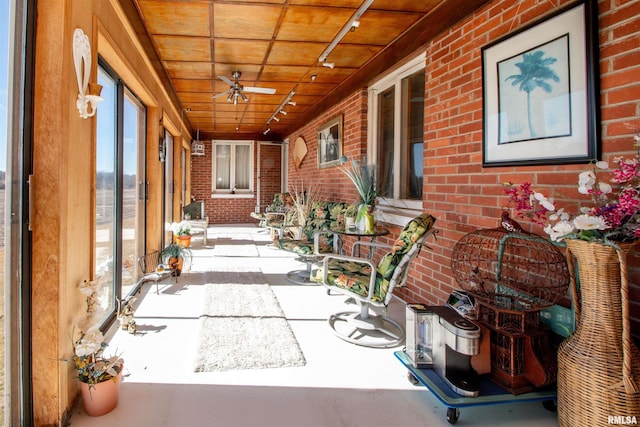 view of patio featuring a porch and a ceiling fan