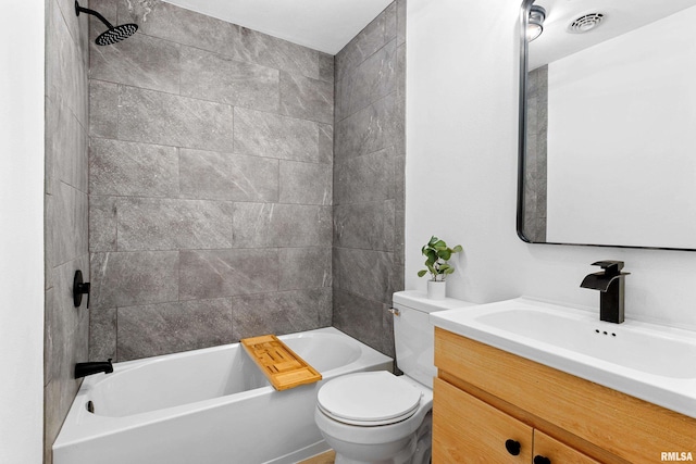 bathroom with toilet, shower / washtub combination, and vanity