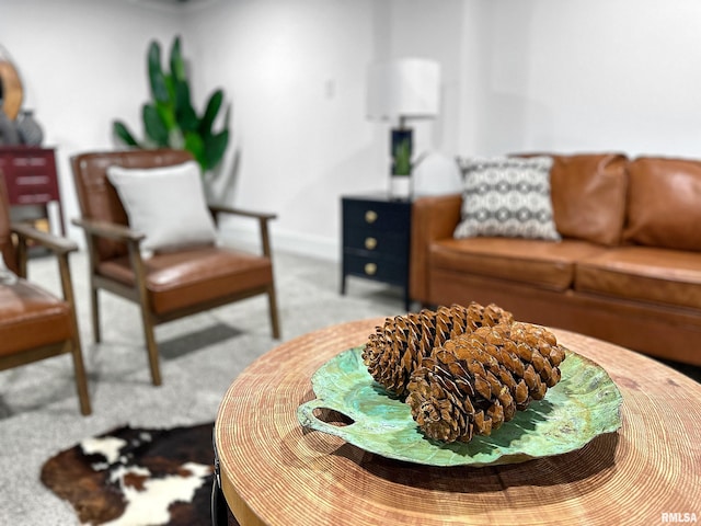 living room with carpet floors and baseboards