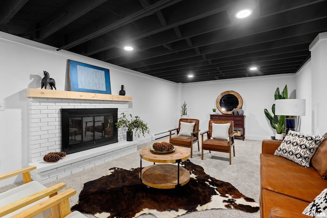 carpeted living area featuring a brick fireplace, baseboards, baseboard heating, and recessed lighting