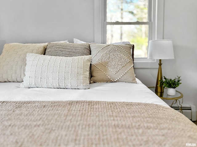 bedroom featuring baseboard heating