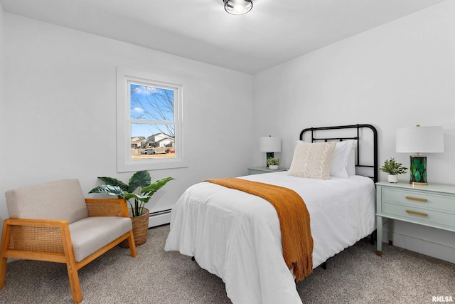 bedroom featuring a baseboard radiator and carpet flooring