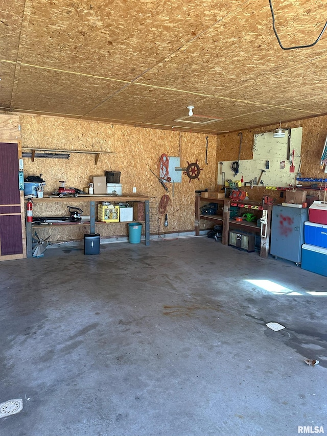 garage with a workshop area