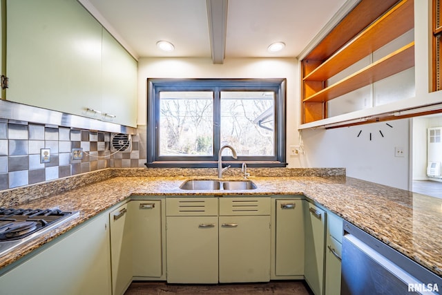 kitchen with a sink, backsplash, open shelves, beamed ceiling, and green cabinetry