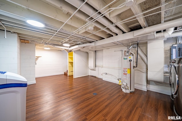 finished basement featuring water heater, washer and clothes dryer, and wood finished floors