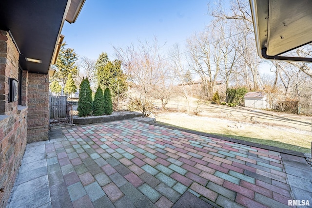 view of patio / terrace featuring fence