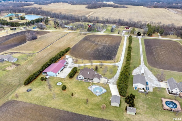 birds eye view of property featuring a rural view