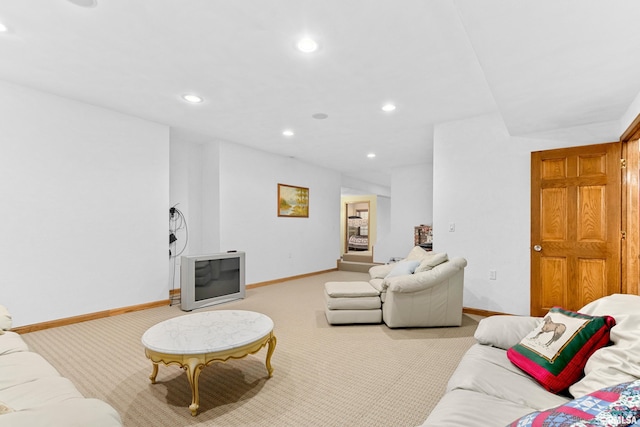 living room with light carpet, baseboards, and recessed lighting