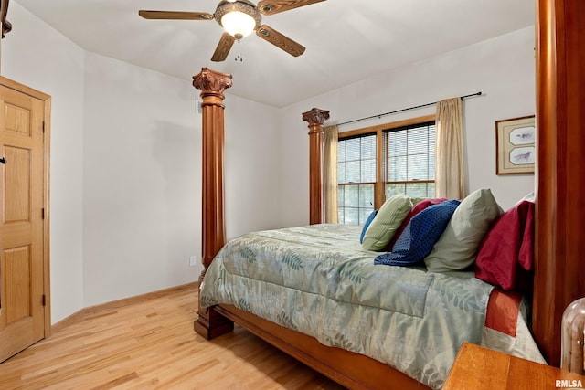 bedroom with light wood-type flooring and ceiling fan