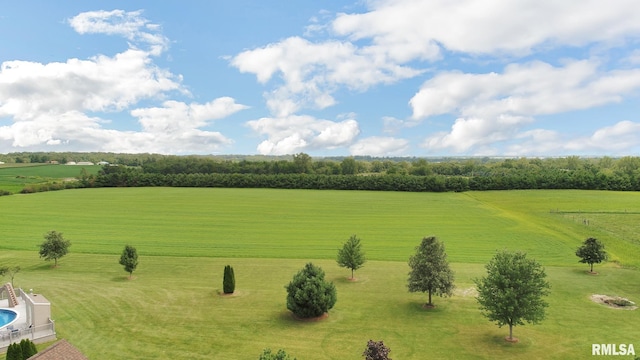 birds eye view of property with a rural view