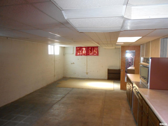 below grade area featuring a drop ceiling