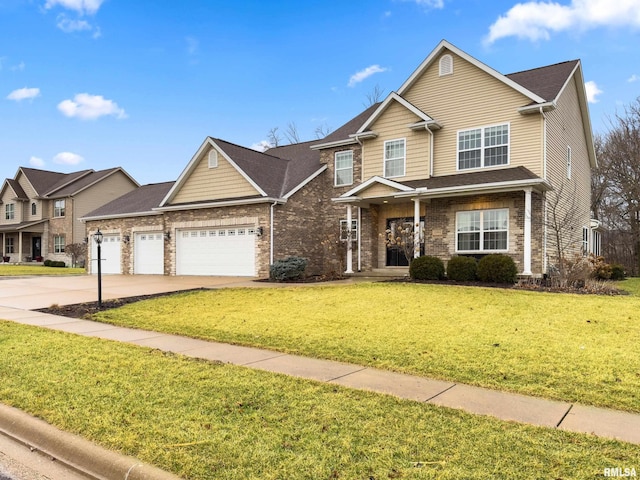 view of front of property with a garage, concrete driveway, brick siding, and a front yard