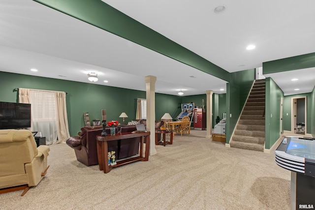 living room featuring carpet floors, recessed lighting, decorative columns, and stairway