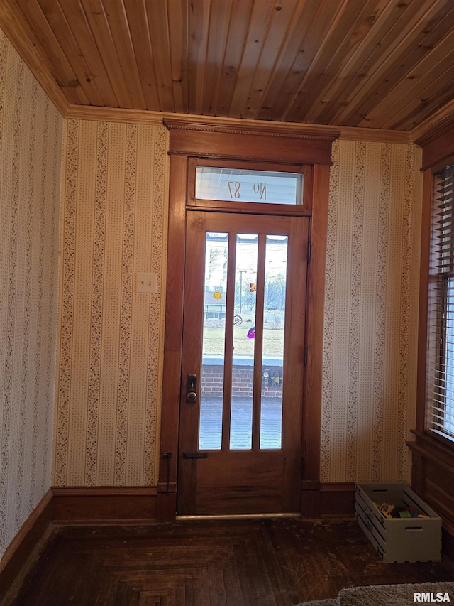 doorway with wallpapered walls, wood ceiling, baseboards, and hardwood / wood-style flooring