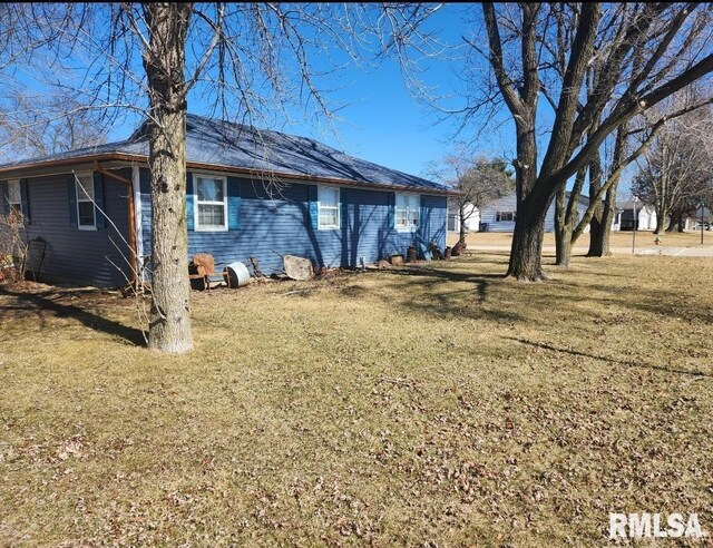 exterior space with a lawn