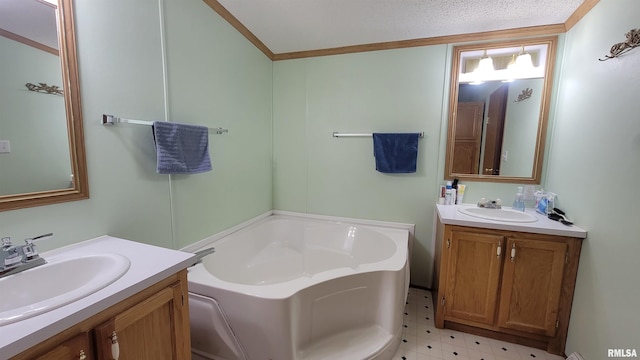 full bathroom featuring tile patterned floors, a sink, two vanities, and a garden tub