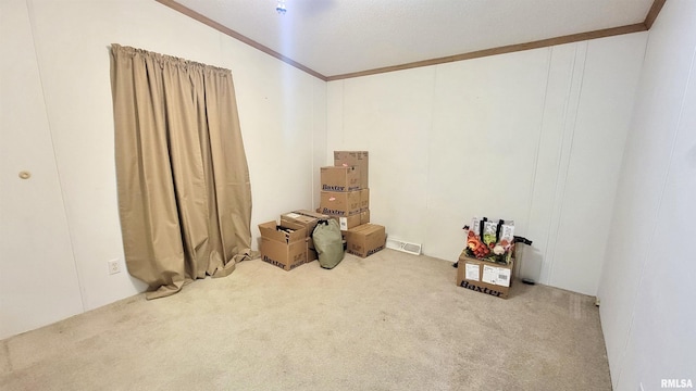 miscellaneous room featuring vaulted ceiling, crown molding, and carpet floors
