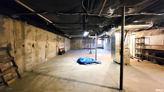 basement featuring heating unit