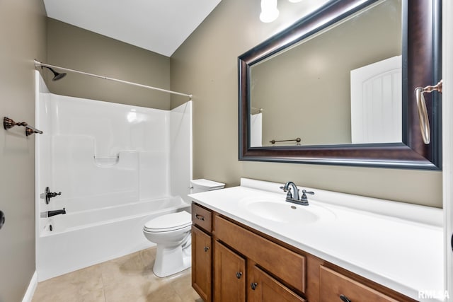 bathroom with vanity, tile patterned floors, toilet, and washtub / shower combination