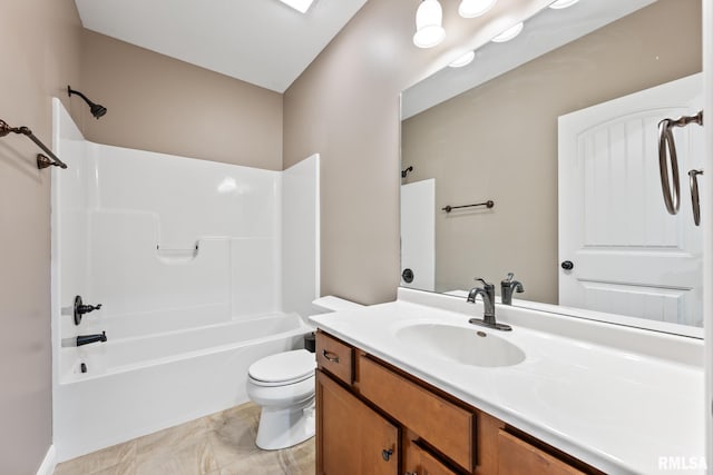 full bath with shower / bathing tub combination, toilet, and vanity