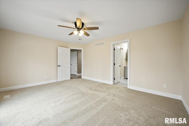 unfurnished room featuring a ceiling fan, baseboards, visible vents, and carpet flooring