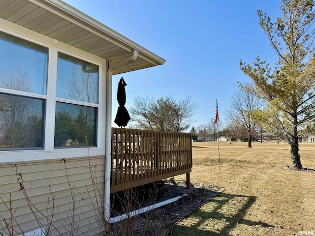 view of yard featuring a wooden deck